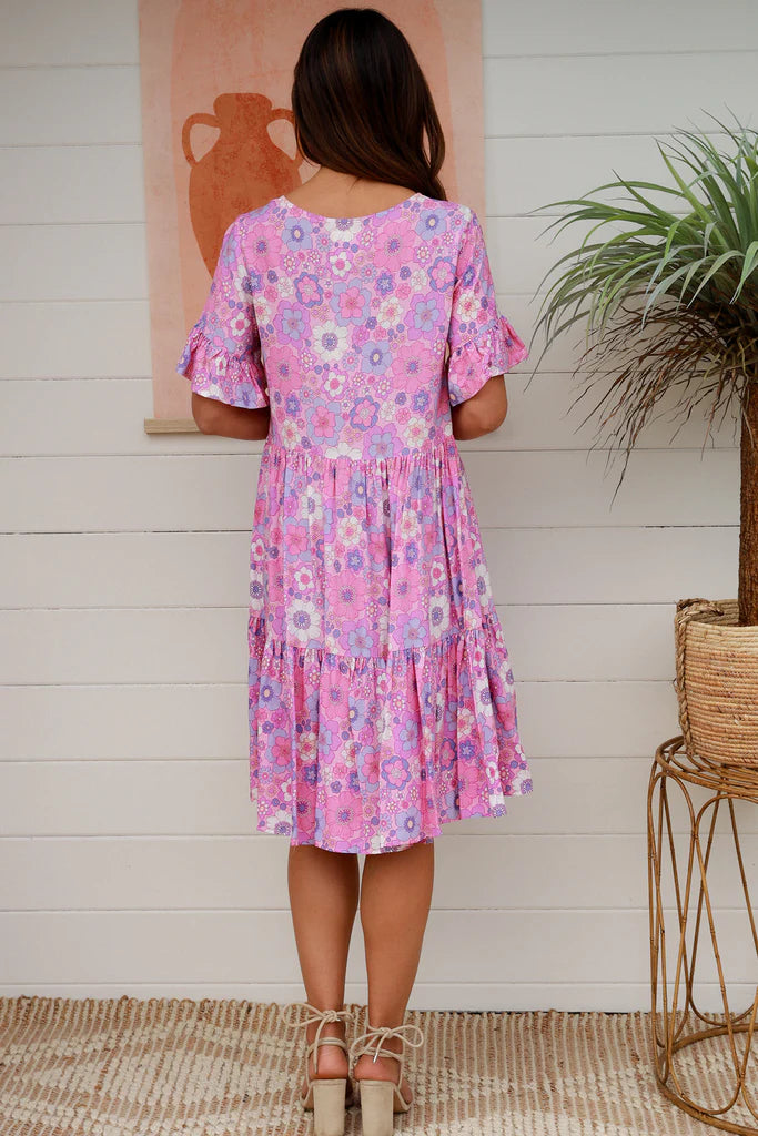 Discover timeless elegance with Eliana Mini Dress. A tiered, drawstring design with a v-neckline and button details creates an effortless look, perfect for any special occasion. Achieve a classic silhouette and enjoy the luxurious feel of this exclusive, sophisticated dress.