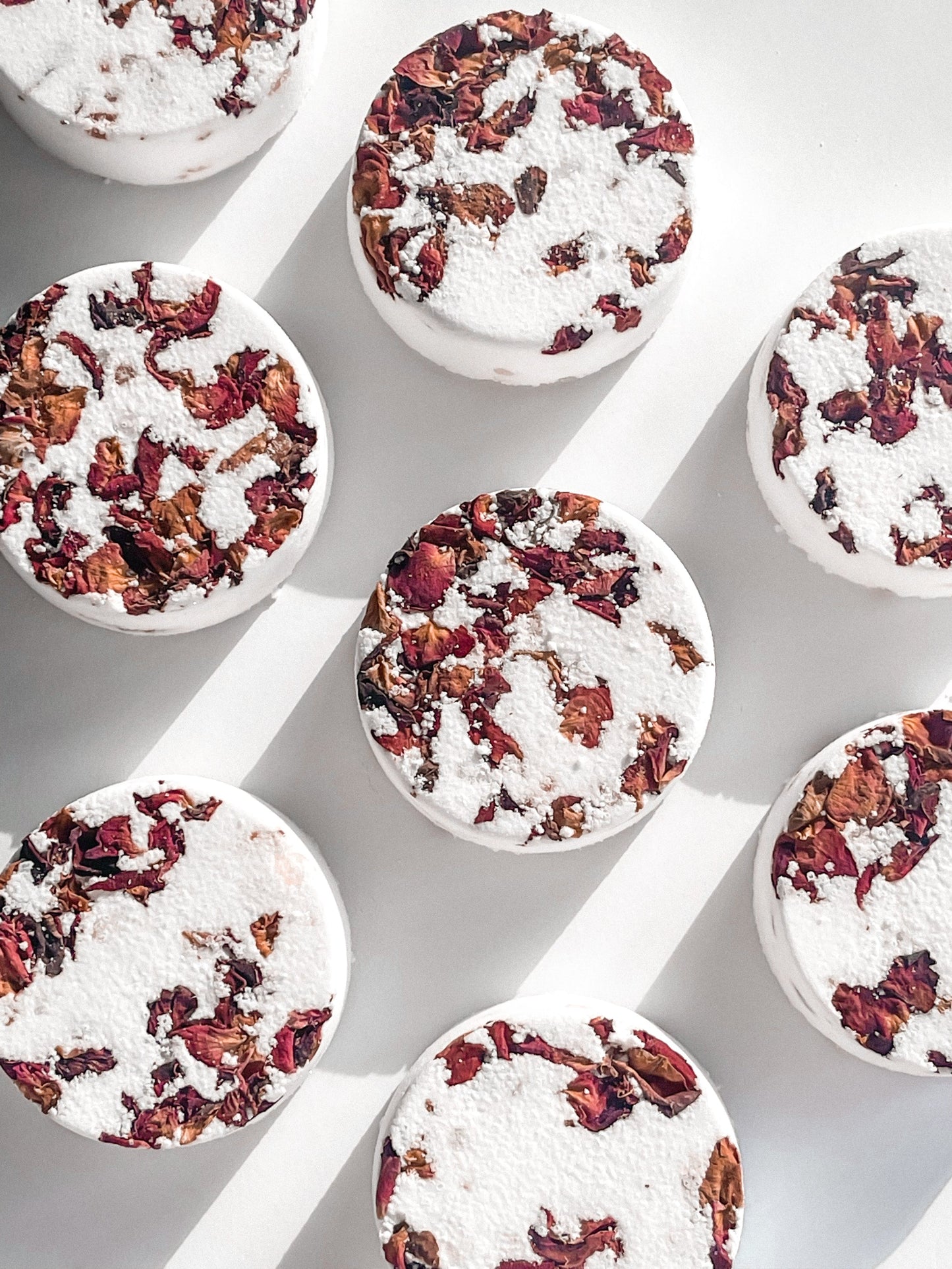 Add some fizz and fun to your bath or shower with our bath/shower fizz! Scented with essential oils and made from natural ingredients like sodium bicarbonate, citric acid, and coconut oil, your skin will feel nourished and refreshed. Treat yourself to a relaxing self-care experience.