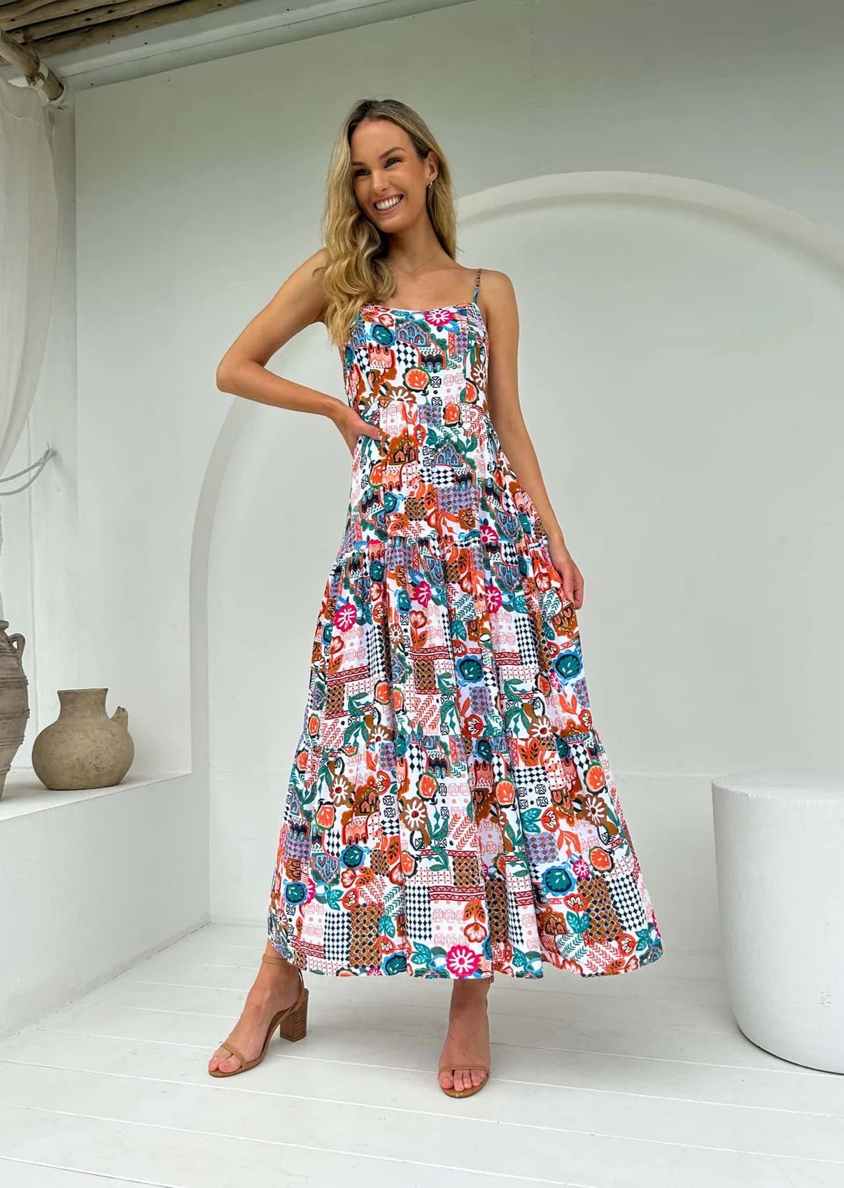 Crafted from luxurious silk fabric, the Georgie Maxi dress oozes elegance and sophistication. With its tie-around detail and low back, this timeless piece is sure to make an impression. Complete with spaghetti straps for a secure fit, you'll be ready to grace any special occasion.