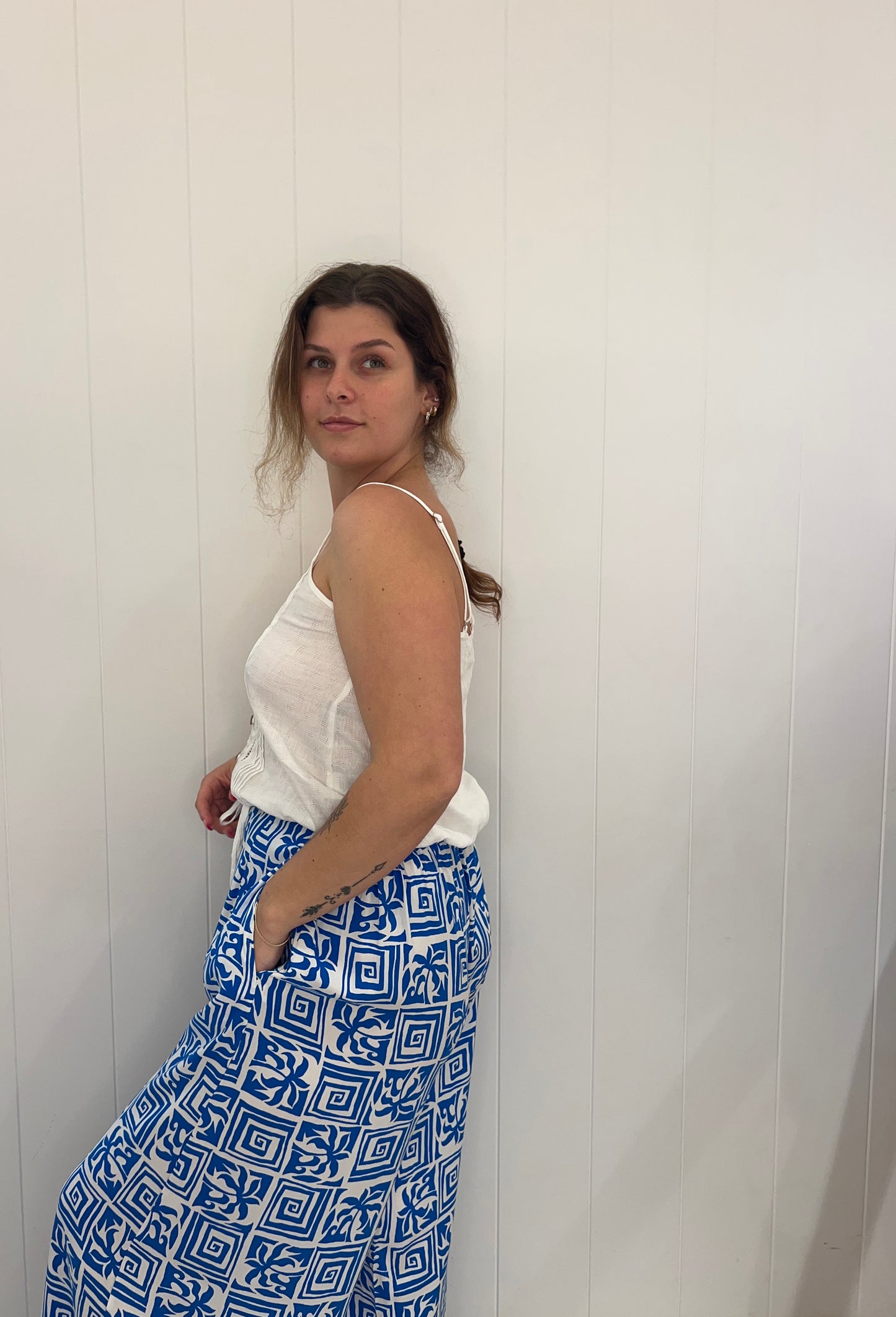 Our Santorini Pants accentuate your figure with effortless grace. With an elasticated waist and timeless pockets, these versatile pants are the perfect addition to your wardrobe for any occasion, providing comfort and elegance.