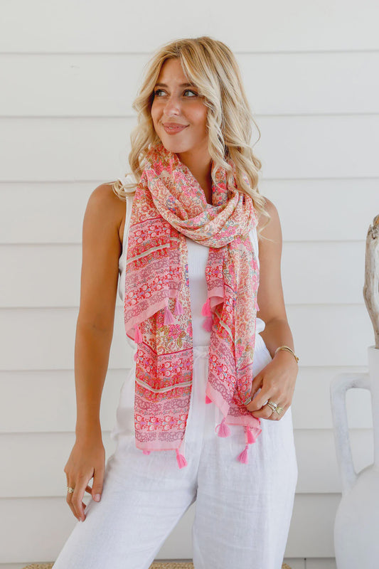 Introducing our Paisley Pink Light Scarf! Perfect for any season, this scarf is both light weight and stylish, making it a versatile accessory for any outfit. With its tassel trim, this scarf adds a touch of fun and flair to your look. Stay fashionable while staying light and breezy!