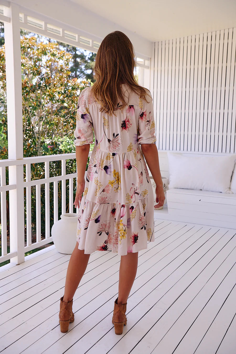 Unleash your inner fashionista with the Finch Mini Dress in Julietta Print. This playful dress features a trendy V-neck, buttoned bodice, and short sleeves. With a waist tie and frilled hem, it's perfect for a day out on the town. (Seriously, you'll look amazing!)
