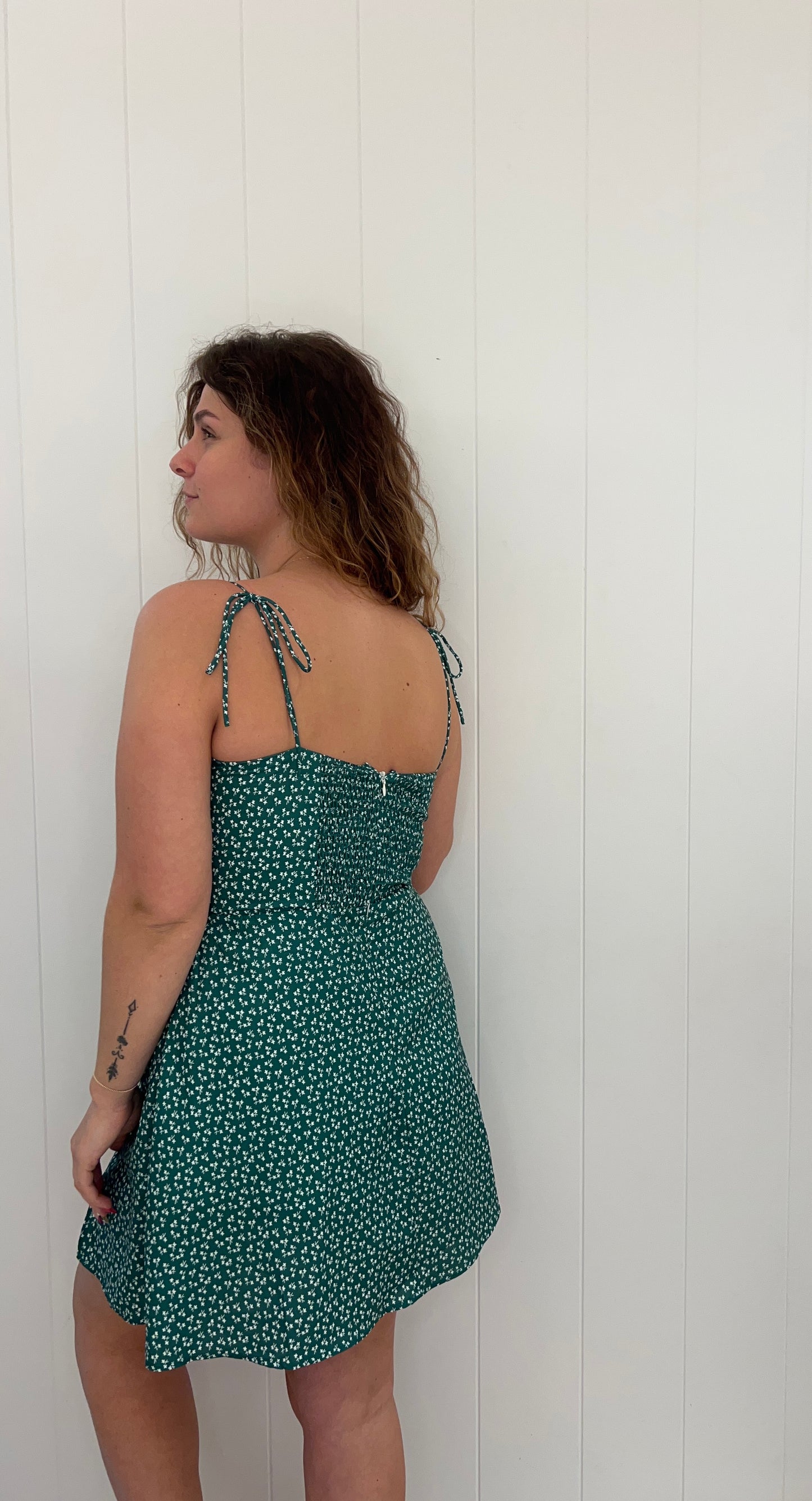 Look your best in this luxurious Holly Mini Dress. Featuring tie up straps, a lined bodice, invisible zipper, and a thigh-high split for alluring appeal, this timeless piece is designed to make an unforgettable impression. Wear it to your next special occasion and be ready to turn heads.