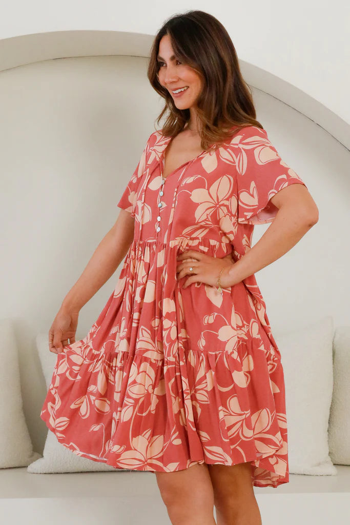 Discover the Kali Mini Dress, a fashion-forward statement piece crafted from luxurious materials. Button detail and a drawstring give a hint of utility, while tiered sleeves lend a graceful, elegant shape with an opulent touch. Express yourself in elevated style.
