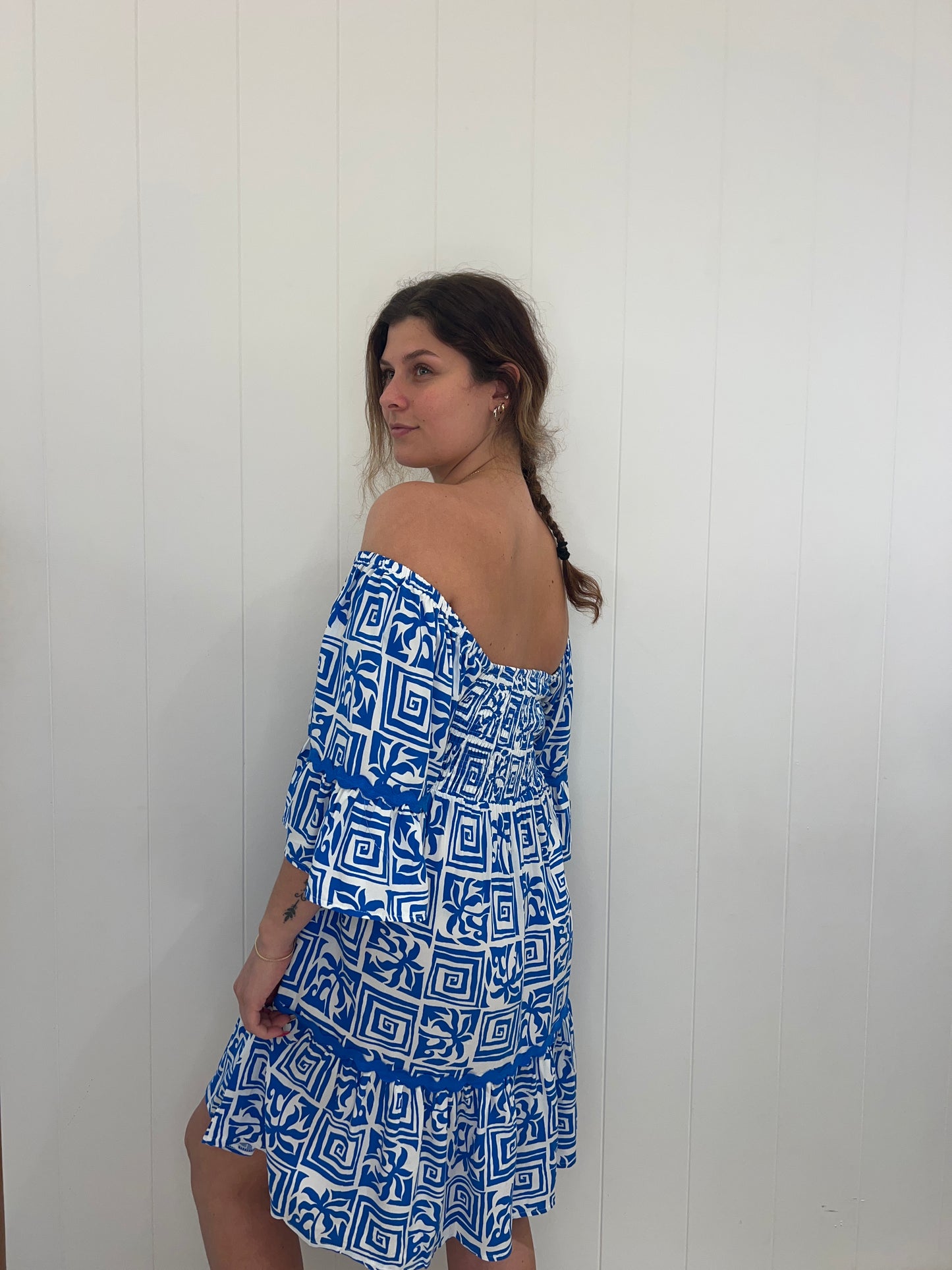 The Santorini Mini Dress will be a showstopper at your upcoming event. Featuring intricate crochet detailing, an off-shoulder option, and an elasticated back, it exudes luxury and elegance. A perfect choice for the fashionista looking for a chic yet exclusive addition to her wardrobe.