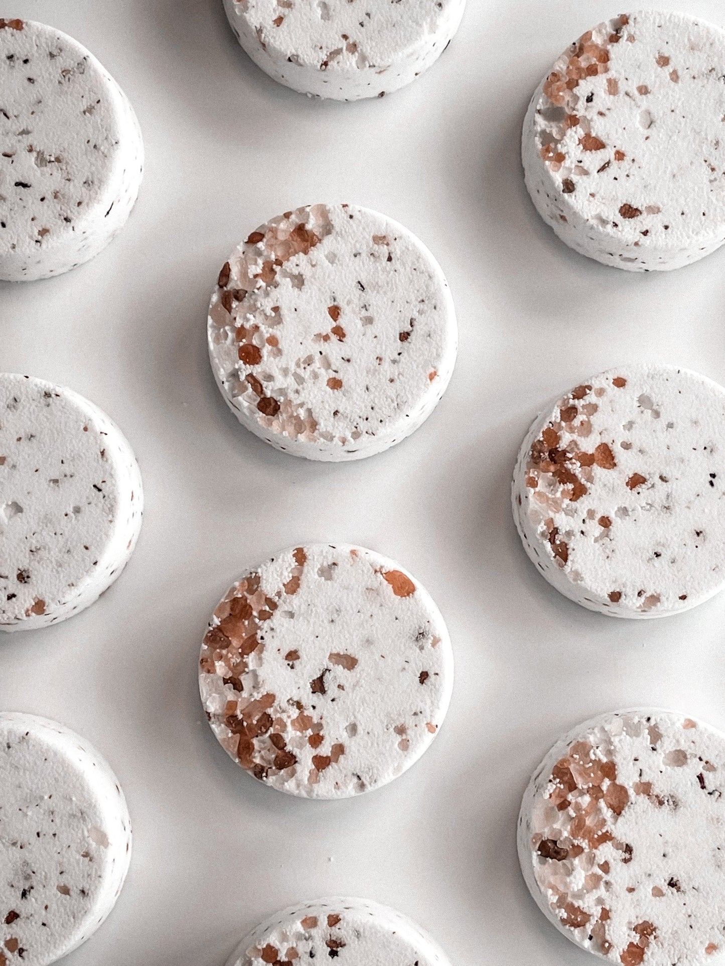 Add some fizz and fun to your bath or shower with our bath/shower fizz! Scented with essential oils and made from natural ingredients like sodium bicarbonate, citric acid, and coconut oil, your skin will feel nourished and refreshed. Treat yourself to a relaxing self-care experience.
