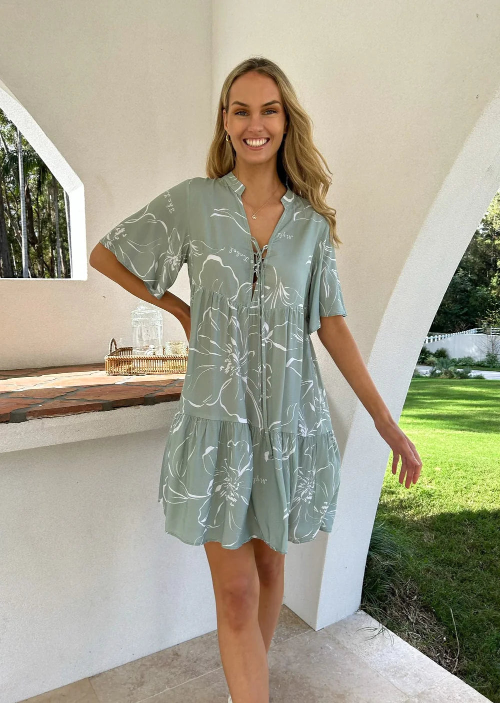 Treat yourself to a regal look with the Arabella Cyprus mini dress. This stylish shift dress features tiered tiers and an adjustable bust for an adjustable fit. Enjoy modern sophistication that looks luxurious and timeless.