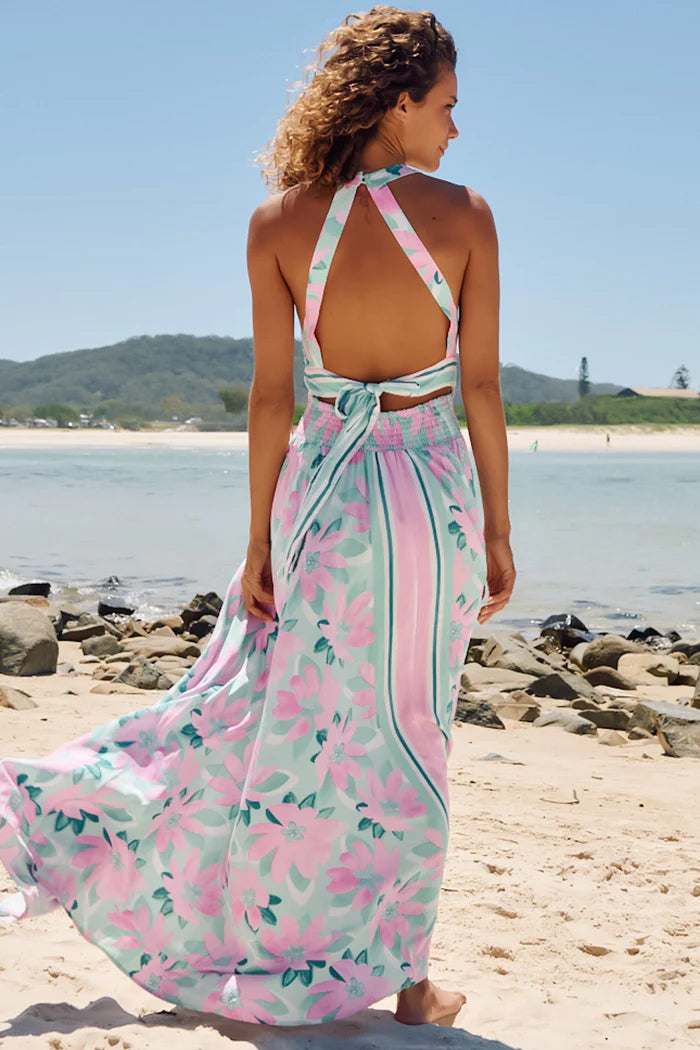 Show off your free spirit in this Endless Maxi Dress. Featuring an elastic ribbed waist, high neck, crochet detail, open back, thigh split, and tie up back - it's the ultimate summer maxi for a wanderlust getaway! Let your style do the talking.