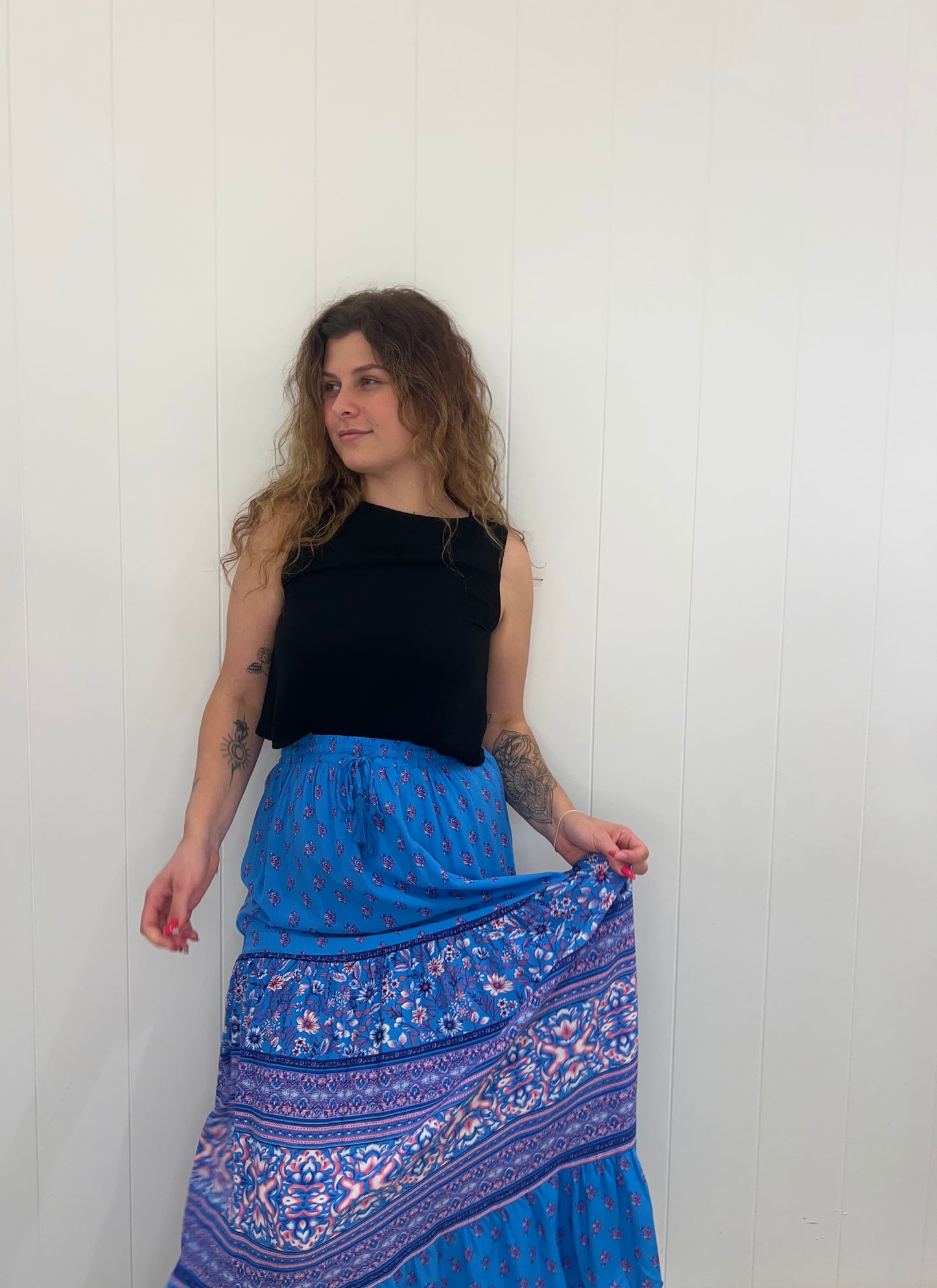 Step out in style in the Abigail Maxi Skirt. With elegant, tassel detailing, and a luxurious floral print, this stunning skirt features an elasticated waist and drawstring for a perfect fit, so you can feel comfortable yet oh-so-stylish.