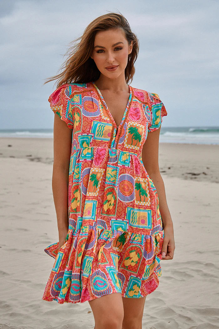 Introducing the Reese Mini Dress in a stunning Sicily print! This dress features a playful V neckline, flirty frilled hem, charming crochet details, and oh-so-cute short sleeves. Perfect for a sunny day out or a casual evening, this dress is a must-have for any fashion-forward individual.