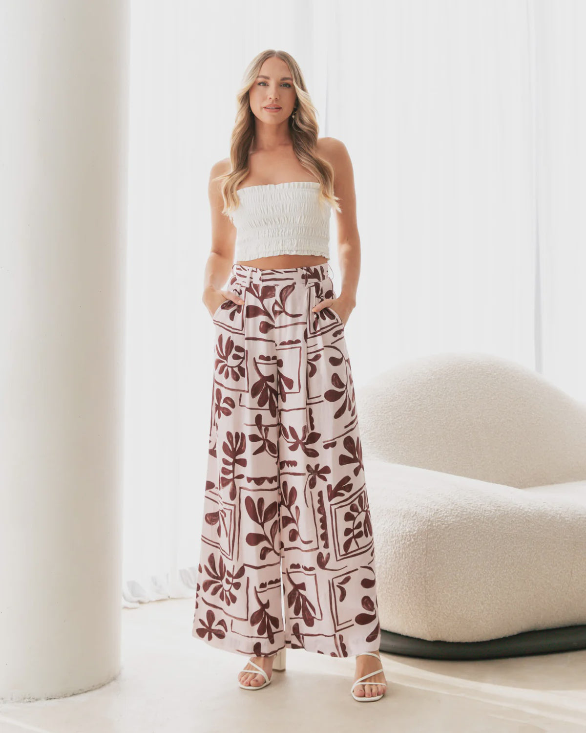 Ditch the mundane, embrace the Coco Pleated Pants. With a fly front and concealed clip closure, these pants offer convenience and style. The wide leg and belt loop add flair while the side and mock back pockets add functionality. A perfect blend of fashion and function.