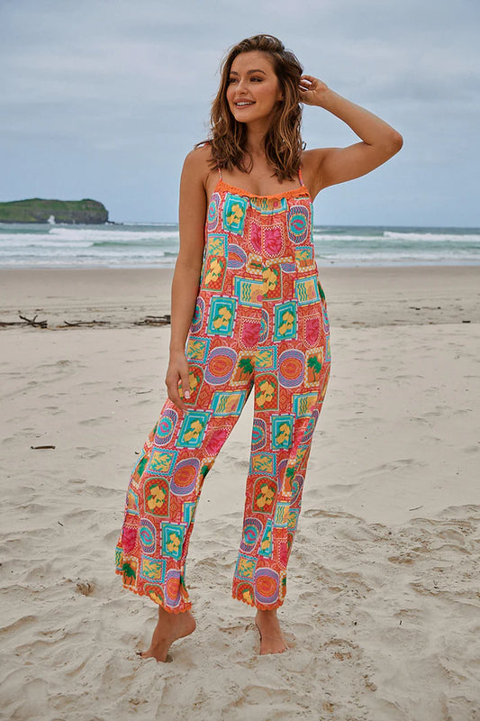 Get ready to jump into style with our Kea Jumpsuit in the vibrant Sicily print. The square neckline and crochet details add a touch of elegance, while the tie up straps and relaxed fit provide comfort and versatility. A must-have for any playful wardrobe. (No, seriously, you NEED this.)