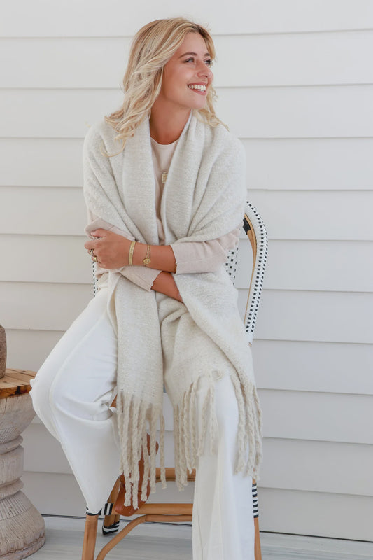 Stay warm and cozy during the winter season with our Winter Lux Soft Cream Scarf. Made with winter weight fabric, it provides extra insulation to keep you warm. The soft touch of the scarf adds a luxurious feel, while the fringing adds a touch of style. Bundle up in comfort and style with our Winter Lux Soft Cream Scarf.