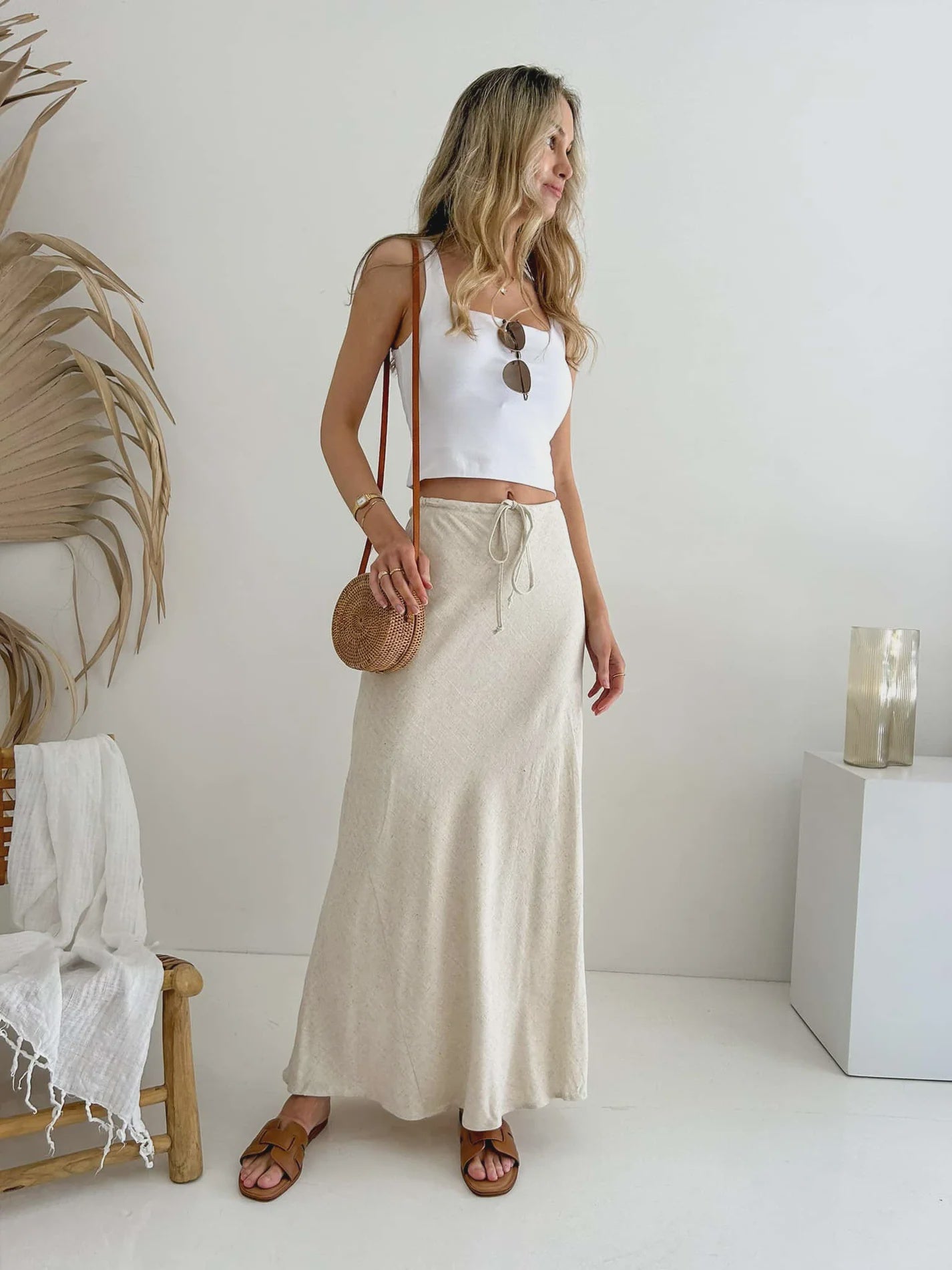 Elevate your style with the Kora Maxi Skirt in a luxurious linen and cotton blend. The fully lined, flowing silhouette and tie waist create an elegant, sophisticated look. Perfect for any occasion, this skirt offers the ultimate blend of comfort and style. Embrace your natural beauty with this exclusive piece.