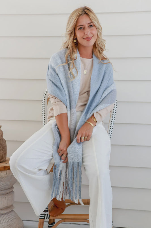 Stay warm and stylish with our Winter Lux Soft Greys Scarf. The perfect weight for those chilly days, this scarf offers a soft touch that will have you never wanting to take it off. Complete with fringing, it's the must-have accessory for any winter look. Don't miss out!