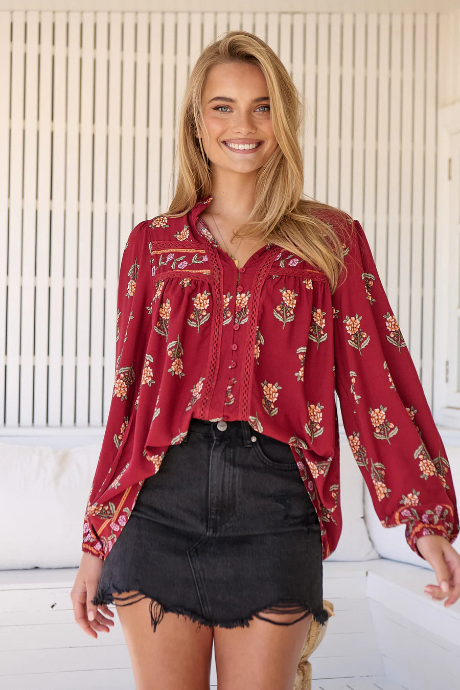 Take your style to the next level with our Bee Blouse - Grenache Print! Featuring a playful V neck line and a small collar, this blouse is perfect for any occasion. The long sleeves with relaxed cuffs and relaxed style add a touch of effortless chic. Buzz-worthy fashion at its best!