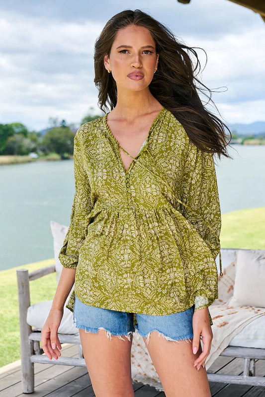 Envelop your silhouette in effortless elegance with the Chloe Top in the Sevillano Print. Crafted from light and breathable material with crochet trimmings and elegant v-neckline, this top offers an oversized and relaxed fit perfect for the modern woman. Delicately elasticised sleeves ensure a perfect fit, making this top a must-have in any wardrobe.