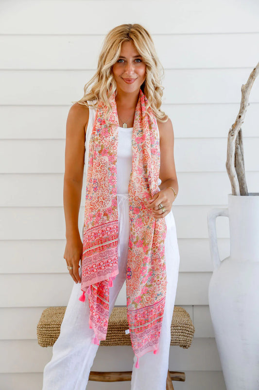 Introducing our Paisley Pink Light Scarf! Perfect for any season, this scarf is both light weight and stylish, making it a versatile accessory for any outfit. With its tassel trim, this scarf adds a touch of fun and flair to your look. Stay fashionable while staying light and breezy!