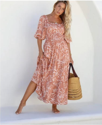 Get ready to turn heads with the Havana Ruched Maxi dress! Made from lightweight and breathable 100% Rayon, this versatile dress can be worn off or on the shoulder. The ruched bodice and elasticised waist provide a flattering fit, while the 3/4 sleeves and 3-tier skirt add a touch of elegance. Perfect for any occasion!