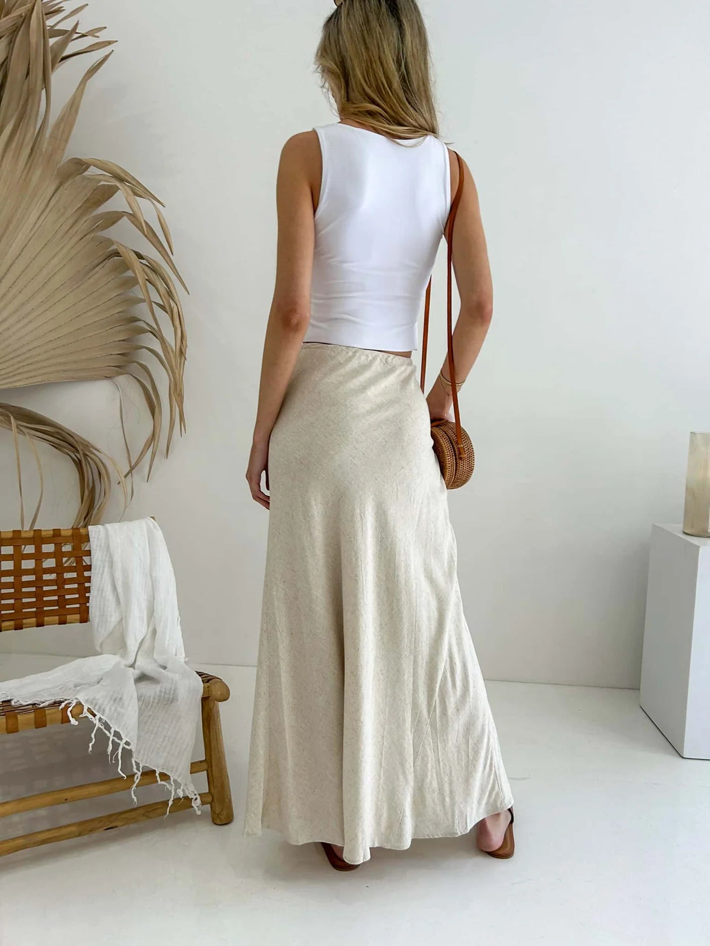 Elevate your style with the Kora Maxi Skirt in a luxurious linen and cotton blend. The fully lined, flowing silhouette and tie waist create an elegant, sophisticated look. Perfect for any occasion, this skirt offers the ultimate blend of comfort and style. Embrace your natural beauty with this exclusive piece.