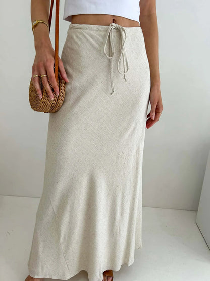 Elevate your style with the Kora Maxi Skirt in a luxurious linen and cotton blend. The fully lined, flowing silhouette and tie waist create an elegant, sophisticated look. Perfect for any occasion, this skirt offers the ultimate blend of comfort and style. Embrace your natural beauty with this exclusive piece.