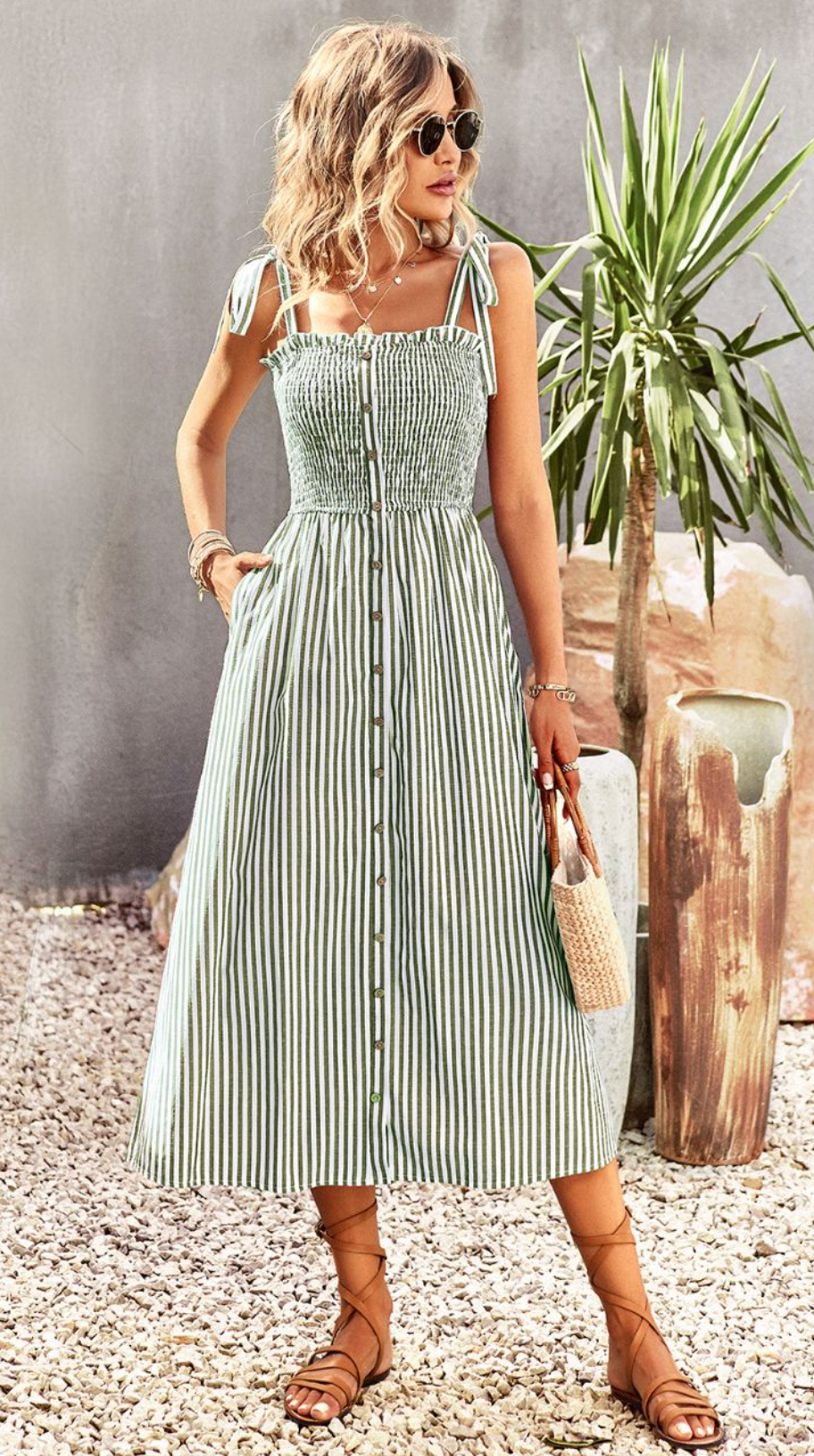 This Melody Midi dress is the epitome of timeless sophistication. With its intricate button details, contemporary tie-up accents, and elegant midi length, this dress is perfect for an evening of luxury and style. With its high quality craftsmanship and exclusive design, this dress will have you effortlessly making an unforgettable statement.