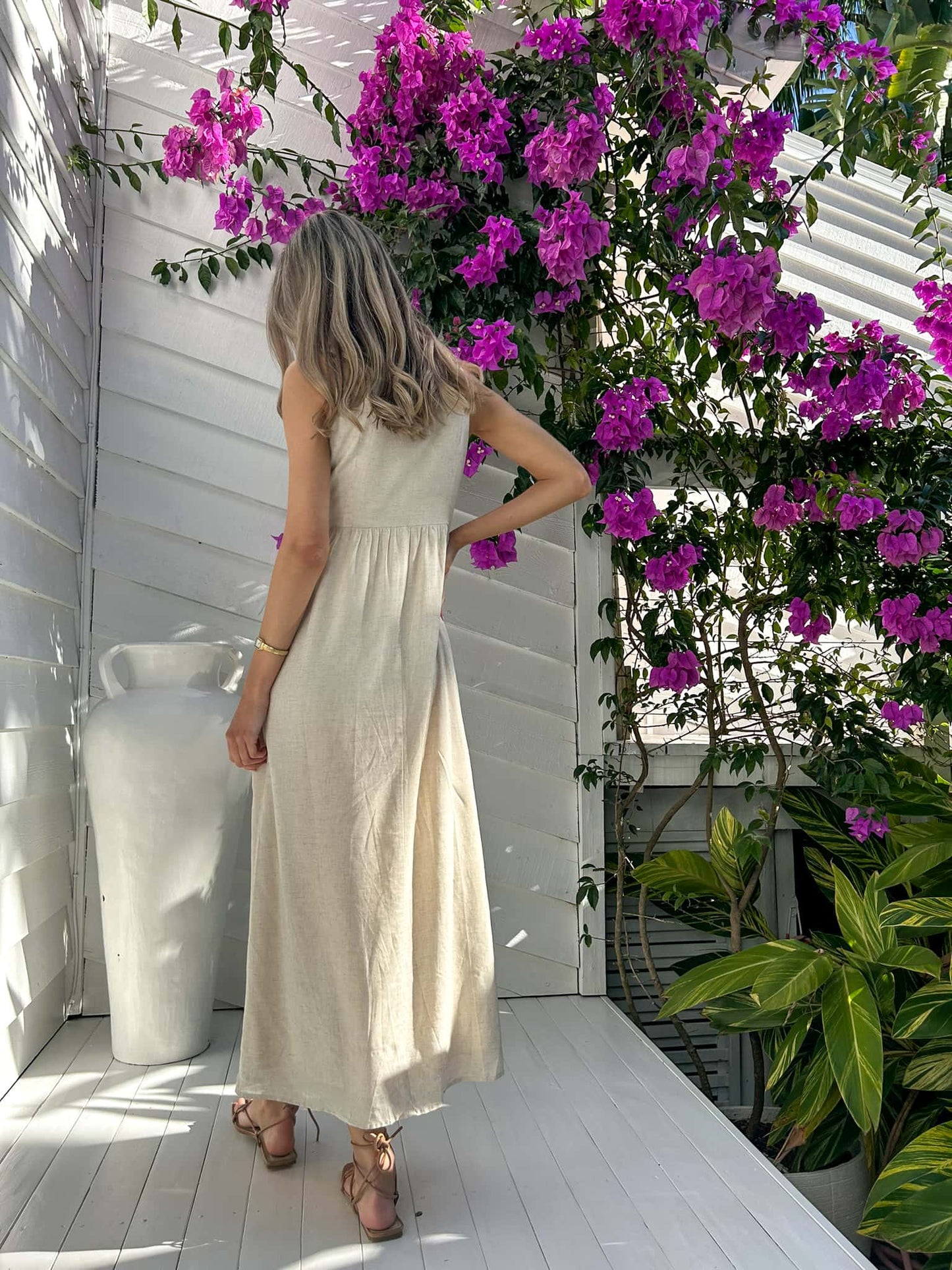 Indulge in the luxurious and exclusive Peyton Maxi - Natural. With its delicate tie bust and elegant lining, this maxi dress exudes sophistication. And with convenient pockets, you'll have both style and practicality at your fingertips. Elevate your wardrobe with this must-have piece.