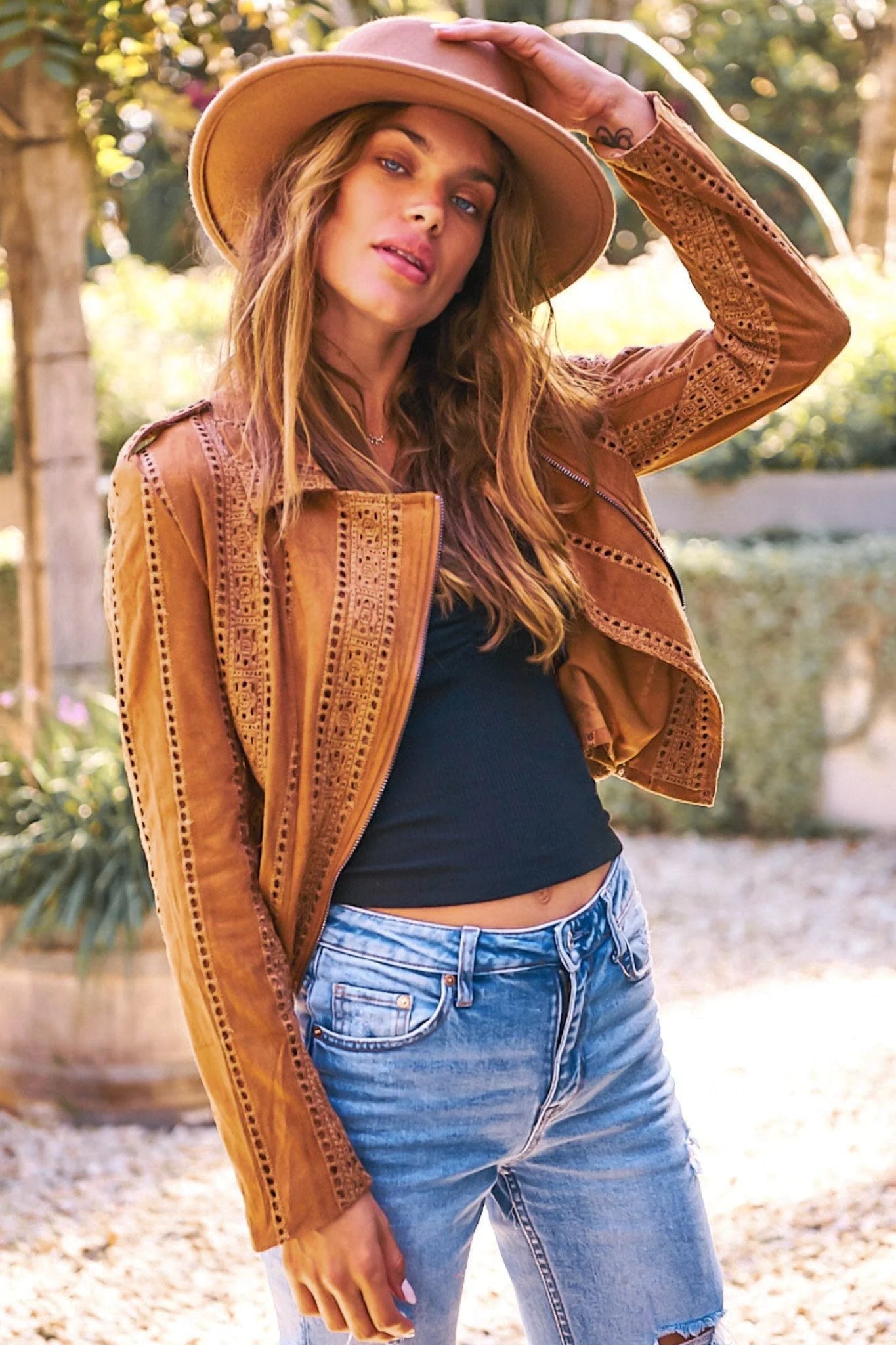 Stay stylish and cozy in our Jodi Jacket! Made with a soft suede feel, this jacket features embroidered details that add a pop of personality. Zip up for warmth and enjoy the added comfort of the lined inside. Perfect for any occasion!