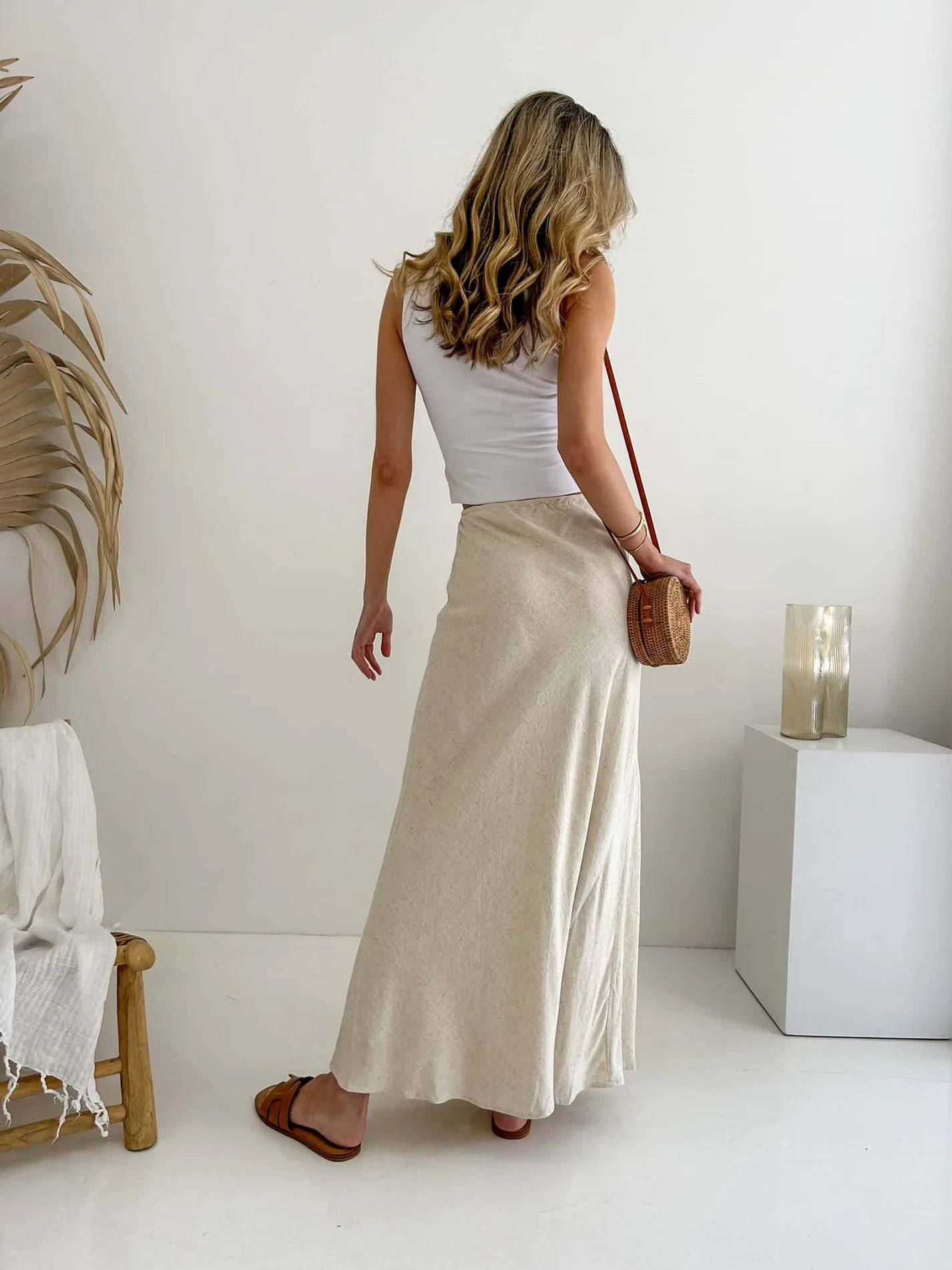 Elevate your style with the Kora Maxi Skirt in a luxurious linen and cotton blend. The fully lined, flowing silhouette and tie waist create an elegant, sophisticated look. Perfect for any occasion, this skirt offers the ultimate blend of comfort and style. Embrace your natural beauty with this exclusive piece.