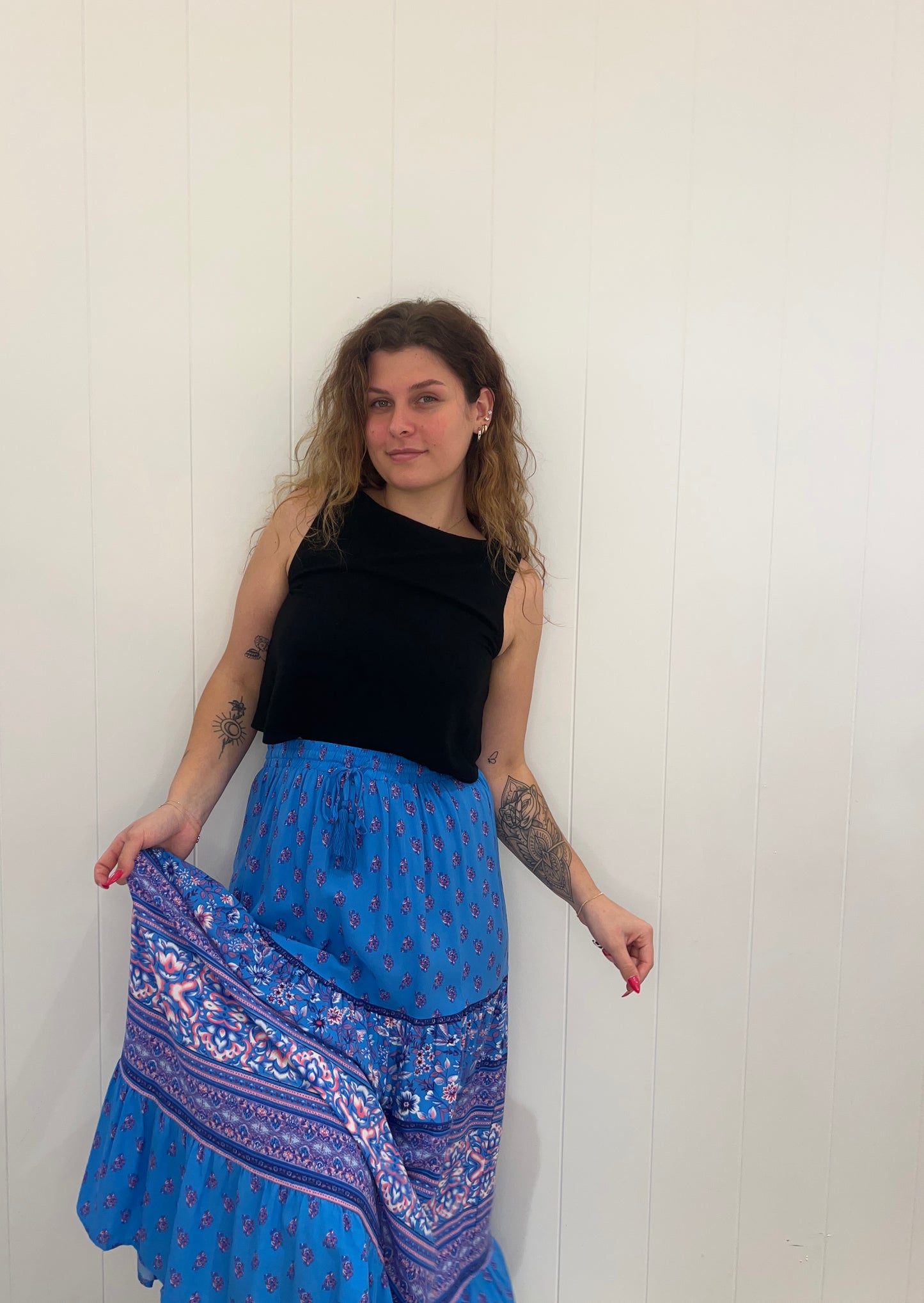 Step out in style in the Abigail Maxi Skirt. With elegant, tassel detailing, and a luxurious floral print, this stunning skirt features an elasticated waist and drawstring for a perfect fit, so you can feel comfortable yet oh-so-stylish.