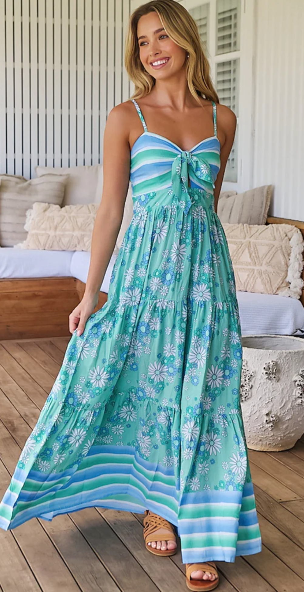 Feel free and feminine in our Bambi Maxi - Malina Print! Elasticised back and adjustable straps provide a comfortable fit, while the tie up bust adds a flirty touch. The tiered skirt adds movement and flow, making you stand out in any occasion. Embrace your playful side with this must-have piece!
