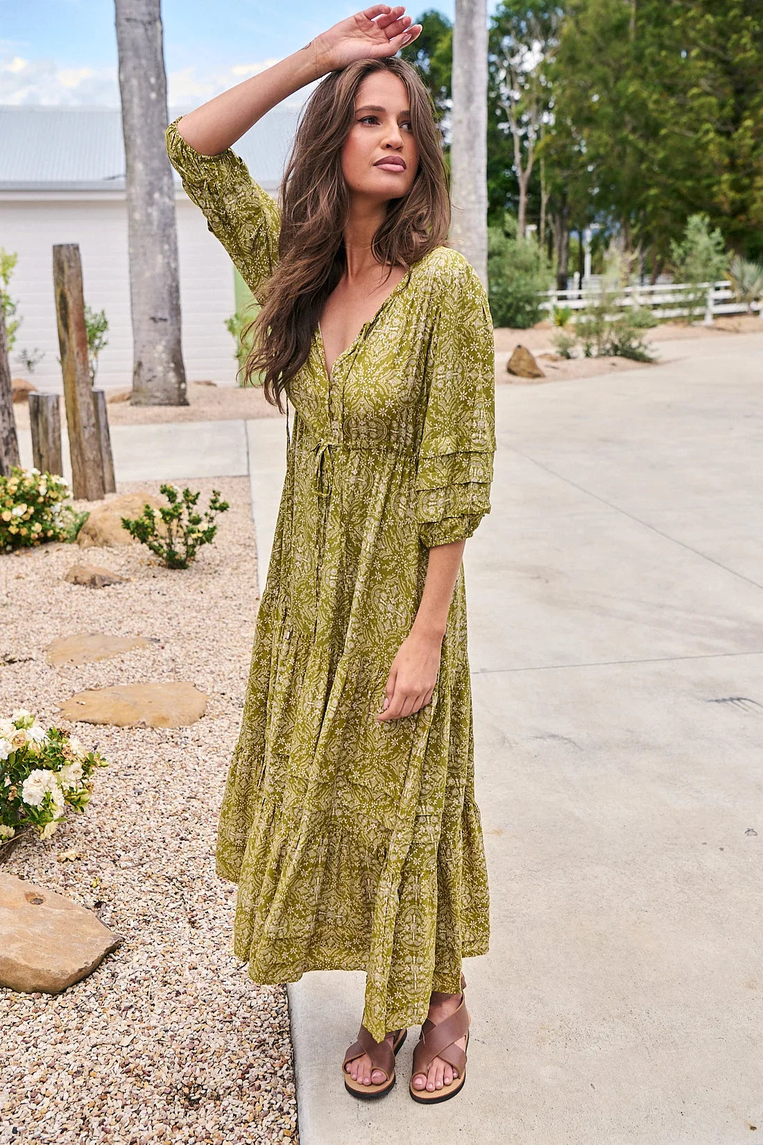 Indulge in exquisite elegance with the Mariana Dress. The Sevillano Print adorns the flowing V Neckline and frilled hem, while lace detailing adds texture and sophistication. The drawstring at the waist allows for a perfect fit. A work of art that will leave a lasting impression.
