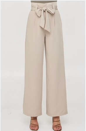 Effortlessly elevate your style with our Louisa Pants in elegant beige. The paper bag style and wide leg design exude sophistication, while the pockets and tie up waist add a touch of functionality. Embrace luxury and comfort with every wear.