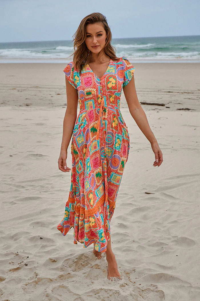 Unleash your wild side with the Romi Maxi Dress in the eye-catching Sicily print. With 3/4 length sleeves and a v-neckline, this dress is both stylish and practical. The drawstring waist and buttons through the bust ensure a flattering fit. Perfect for a day out or a night on the town!