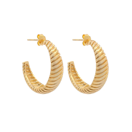 Introducing Messina Hoops Gold, the perfect earrings for all skin types! These hoops are hypoallergenic and nickel-free, making them ideal for sensitive skin. And with their non-tarnish feature, you'll never have to worry about keeping them shiny and beautiful. Elevate your style and comfort with Messina Hoops Gold!