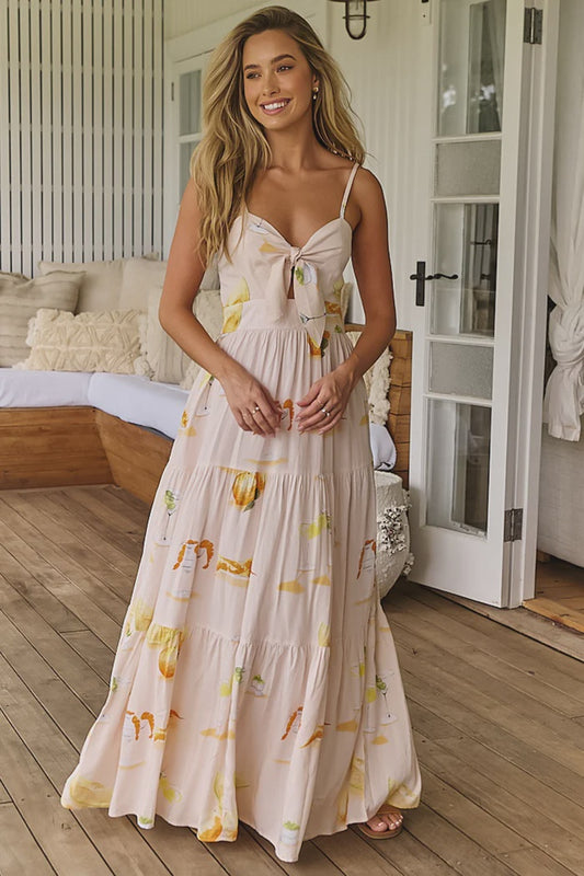 Our Bambi Maxi Dress in the Summer Spritz Print proves that elegance is timeless. With an elasticised back, tie up bust, adjustable straps, and tiered skirt, this sophisticated dress will have you feeling enchanting and cared for. Go beyond classic beauty and make a statement.