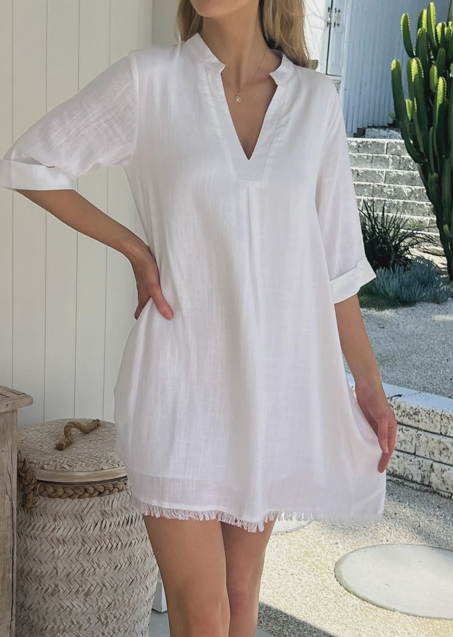 Add some fun to your wardrobe with the Ikon Linen Dress! This effortlessly cool dress features a mandarin neckline, shift fit, and pockets for convenience. The lined design and frayed hem add a touch of edginess. A must-have for any fashion-forward individual