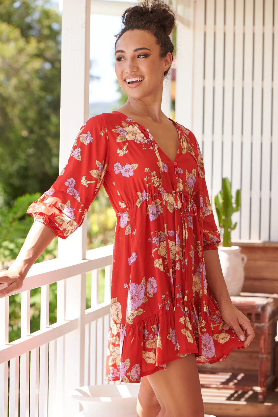 Elevate your style with the Faith Mini - Aiko. Featuring a neck tie and three quarter sleeves, this dress offers a versatile and comfortable fit. The drawstring waist and frilled hem add a touch of femininity, making it the perfect addition to your wardrobe.