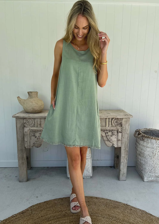 Frayed hem? Shift fit? Pockets? Lined? The Freya Dress has it all! This playful jade dress effortlessly combines style with function. No need to sacrifice comfort for fashion with this quirky and fun addition to your wardrobe.